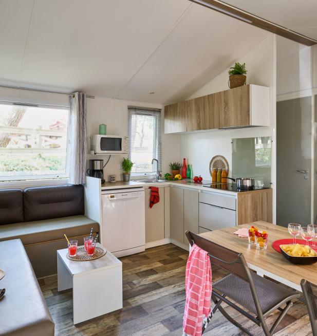 Pièce de vie Mobil-home Famille camping Signol