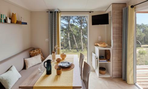 Pièce de vie mobil-home Loggia camping Les Chalands Fleuris